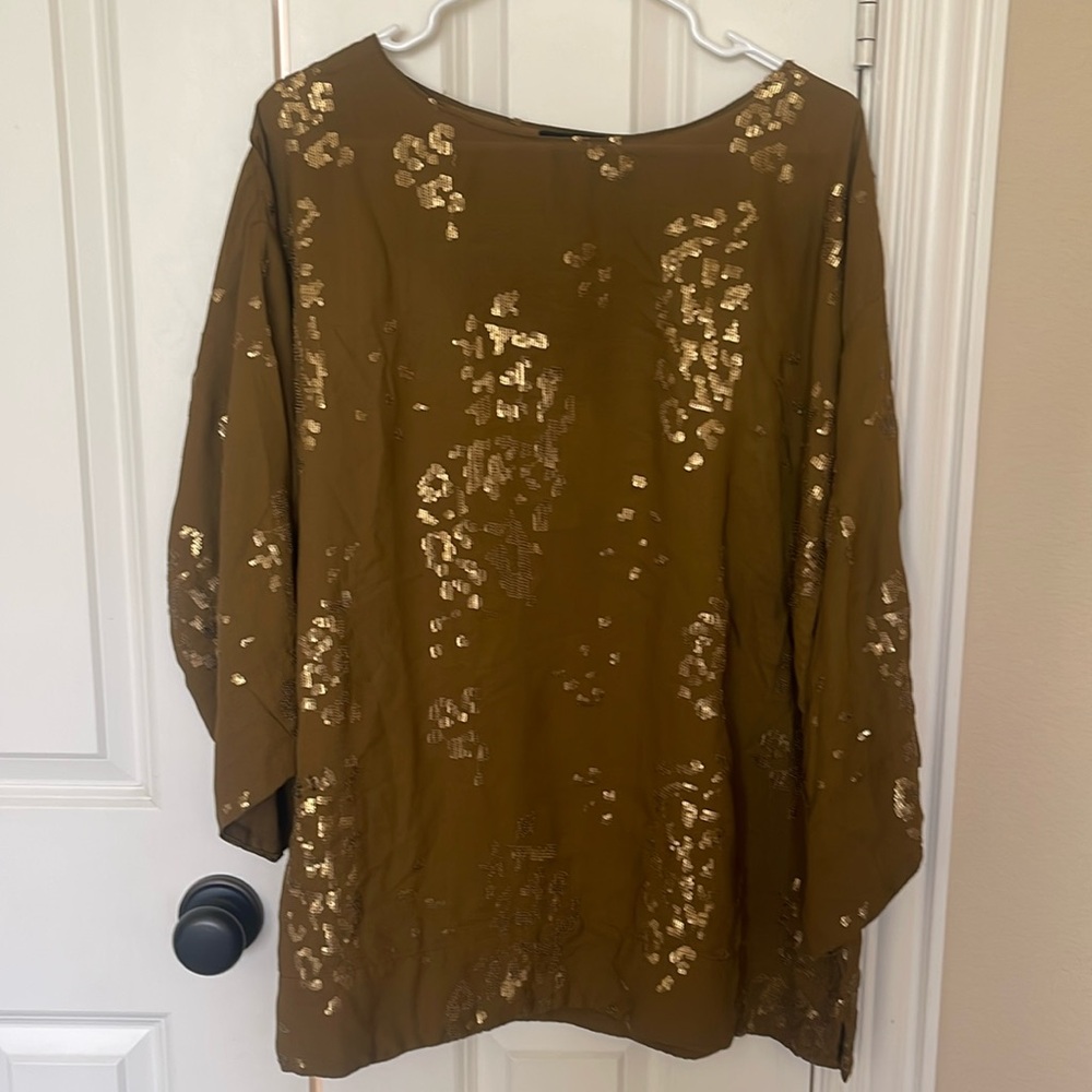 Pakistani / Indian Lime Light brownish gold short shirt with loose pants.